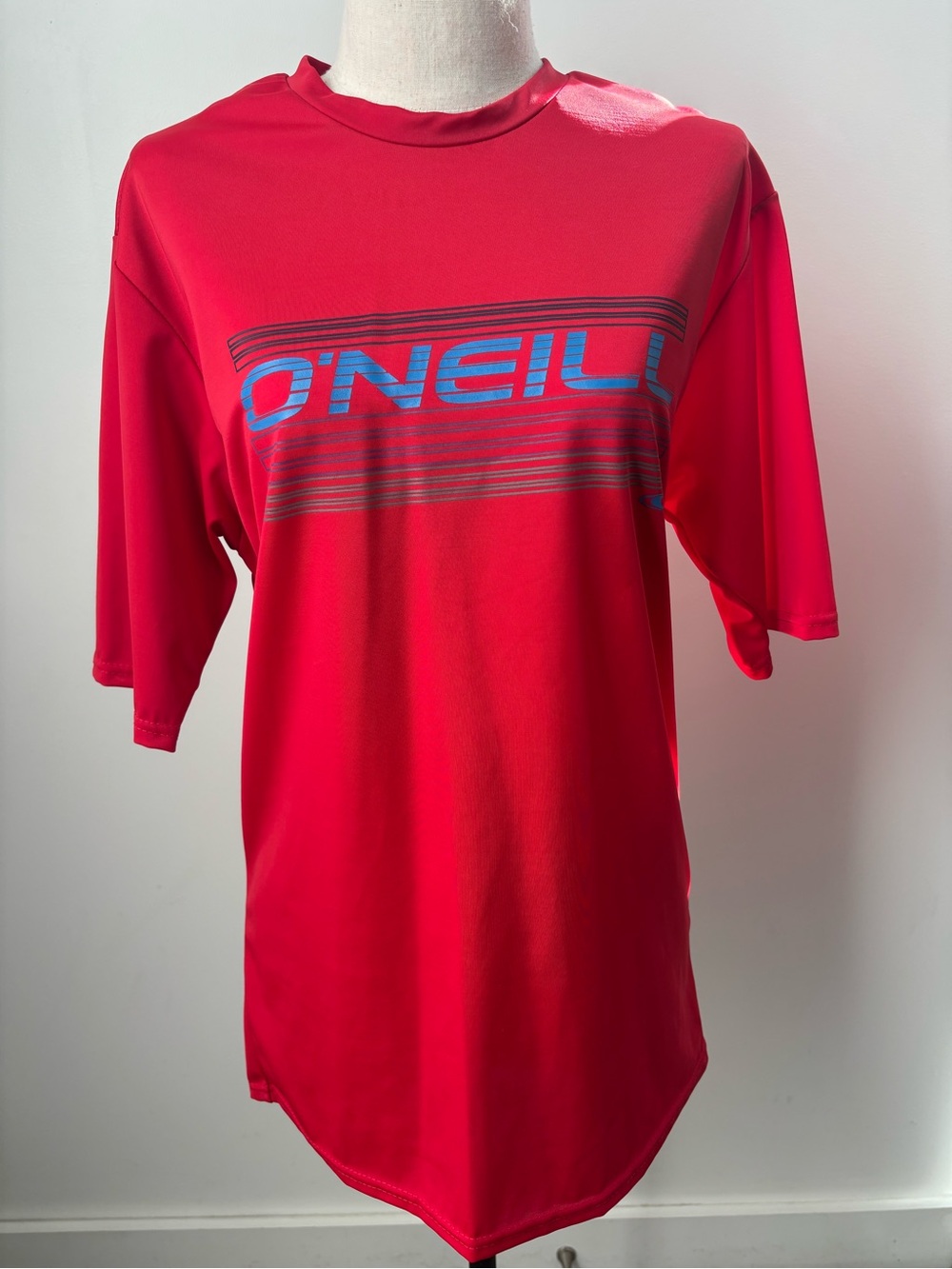 O'Neill Red Short-Sleeve rash guard with Blue Accent with 50 plus uv protection